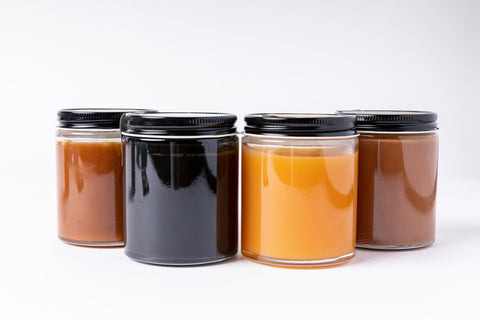 Four jars of handcrafted spreads, Rich and creamy indulgence.